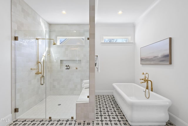 bathroom featuring independent shower and bath and ornamental molding