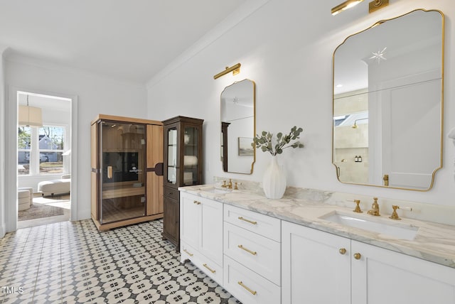 bathroom with vanity and crown molding