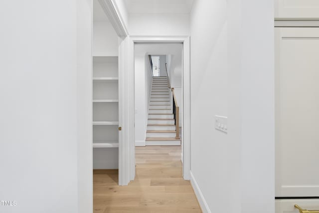 hallway featuring light hardwood / wood-style flooring