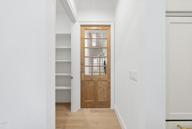 corridor featuring light wood-type flooring