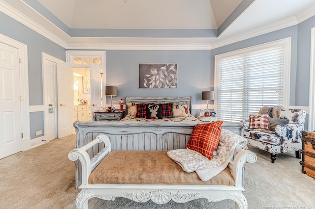 bedroom with lofted ceiling, light carpet, and ornamental molding