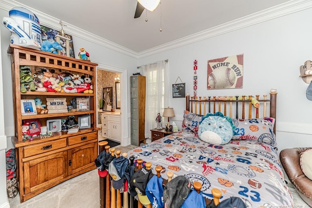 bedroom with light carpet, ensuite bath, crown molding, and ceiling fan