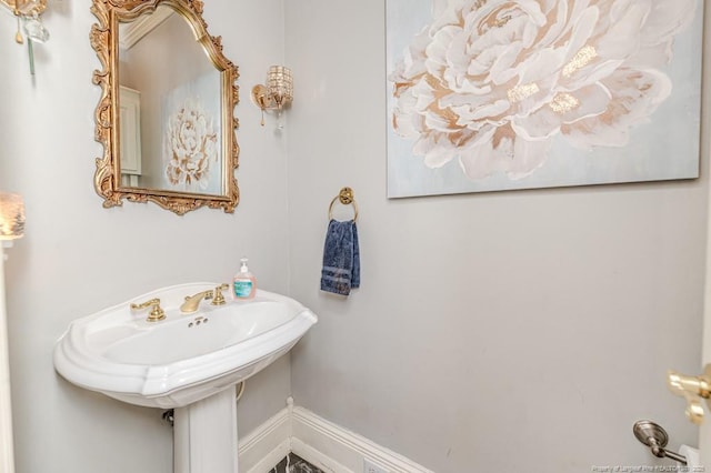 bathroom featuring baseboards