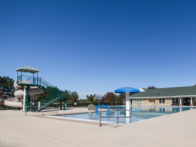 community pool with a patio