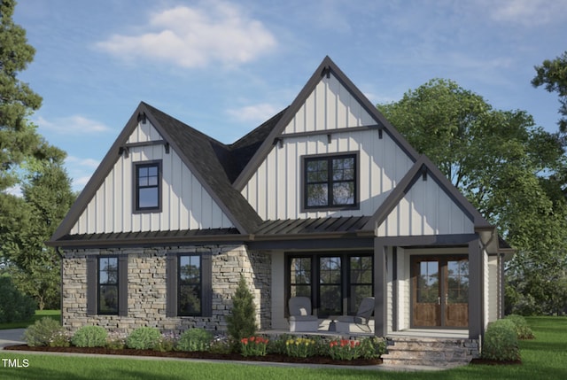 modern farmhouse style home with covered porch, board and batten siding, a standing seam roof, metal roof, and stone siding