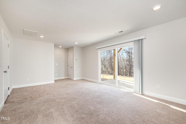 unfurnished room featuring carpet flooring