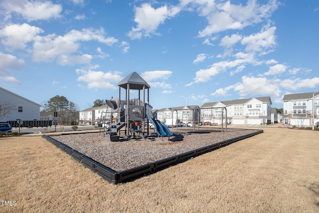 view of playground with a yard