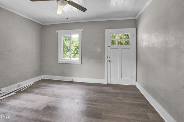 foyer with ceiling fan, ornamental molding, and dark wood-type flooring