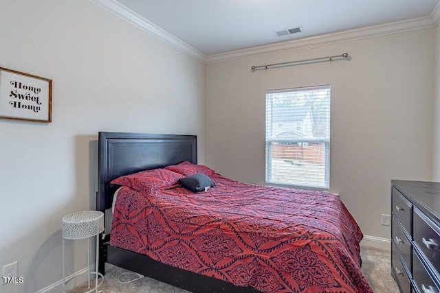 bedroom with carpet and ornamental molding