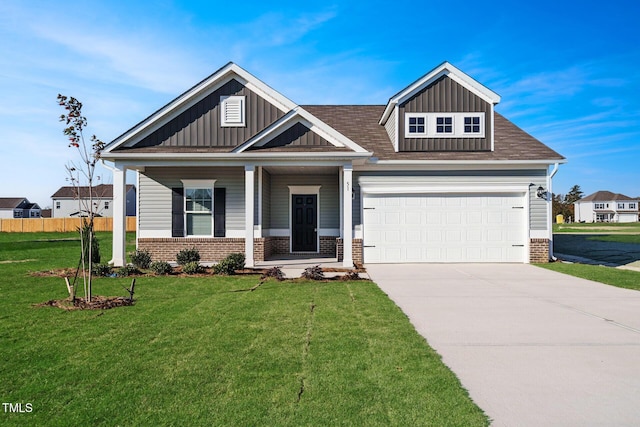 craftsman-style house with a front yard