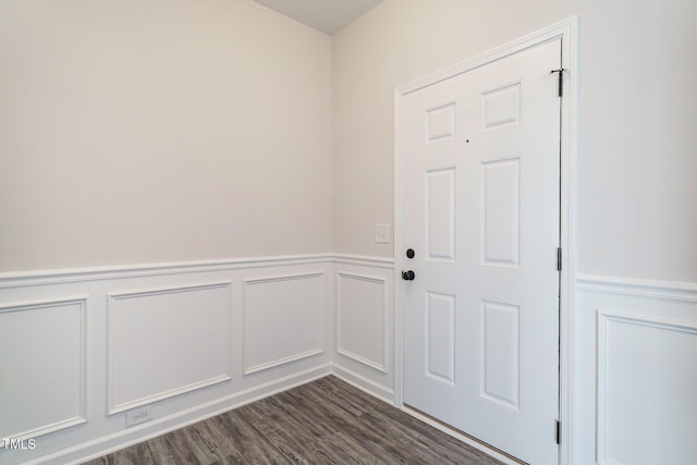 doorway to outside with dark hardwood / wood-style flooring