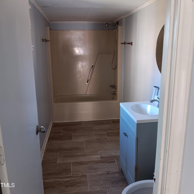 full bathroom with vanity, toilet, shower / tub combination, and crown molding