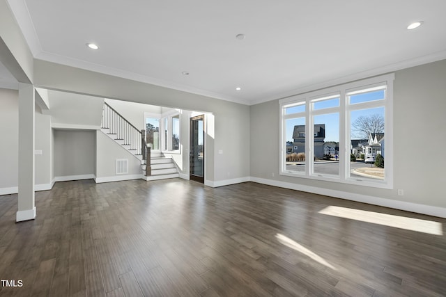 unfurnished living room with dark hardwood / wood-style floors and crown molding