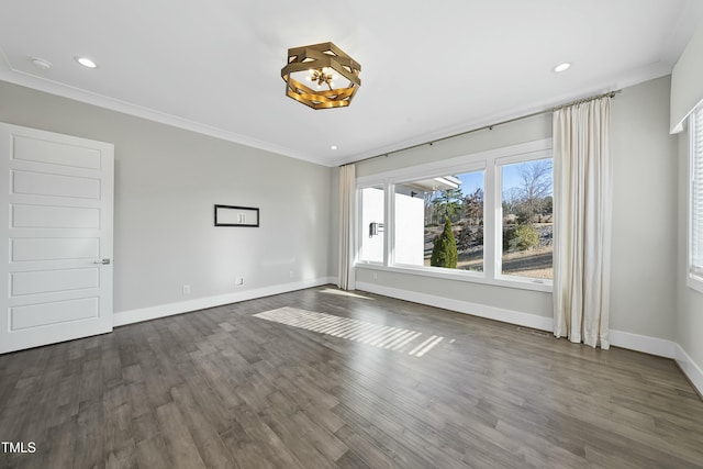 unfurnished room featuring dark hardwood / wood-style floors and crown molding