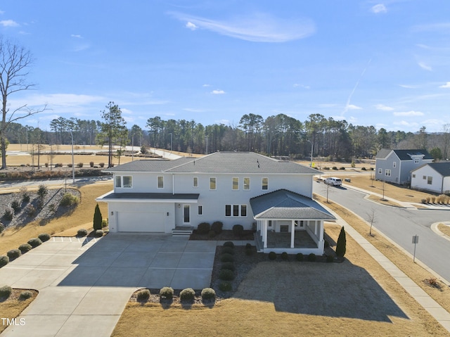 view of front of property with a garage