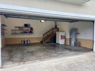 garage featuring gas water heater