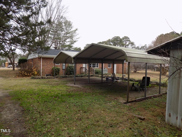 view of yard featuring a carport