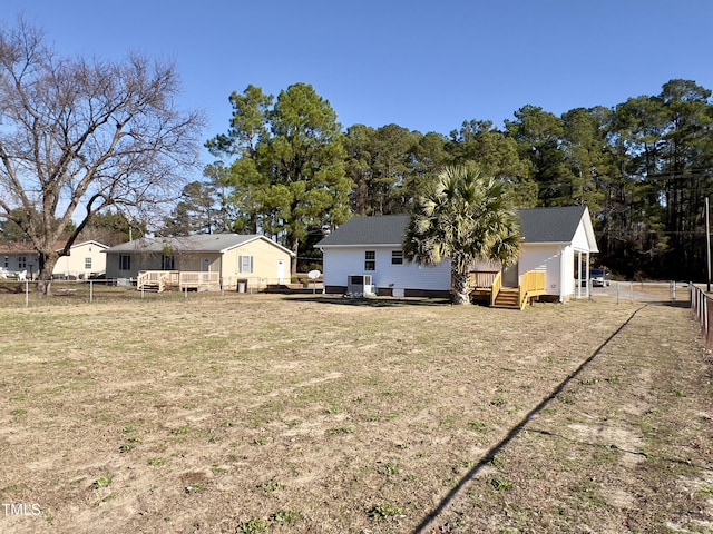 view of yard with a deck