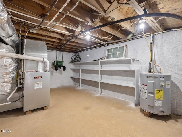 basement featuring heating unit and water heater