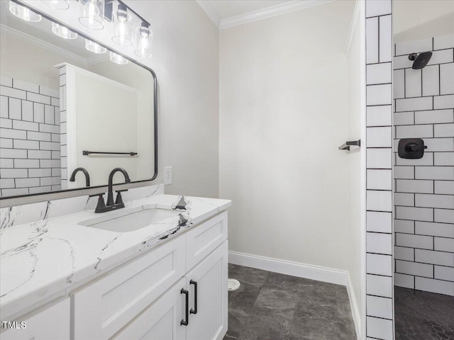 bathroom featuring a tile shower, vanity, and ornamental molding