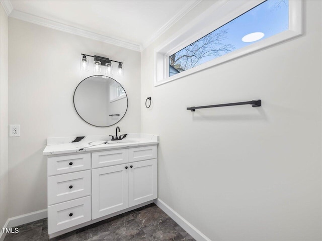 bathroom featuring vanity and ornamental molding