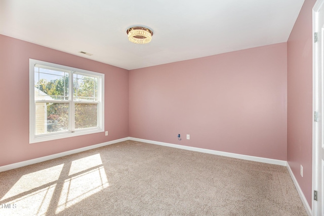 unfurnished room with carpet