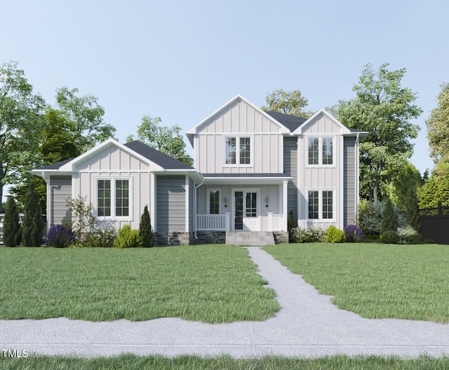 view of front of property with covered porch and a front lawn