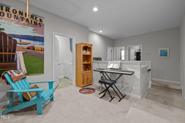 interior space featuring light carpet and a kitchen bar