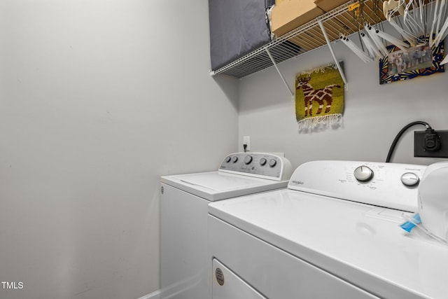 laundry area featuring separate washer and dryer