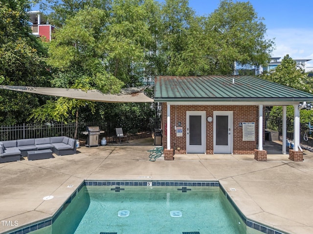 1535 Caraleigh Mills Ct Unit 221, Raleigh, NC 27603 - community pool featuring a patio, an outdoor structure, an outdoor living space, and a storage structure