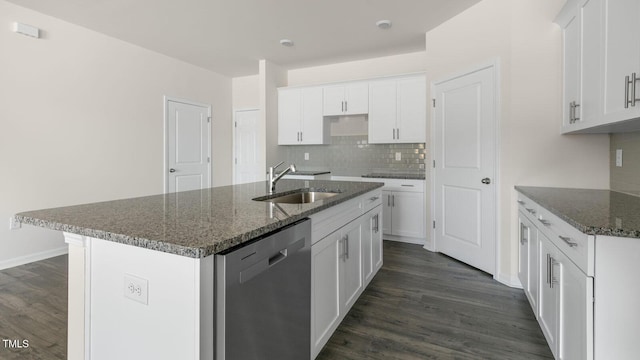 kitchen with dishwasher, sink, white cabinetry, and an island with sink