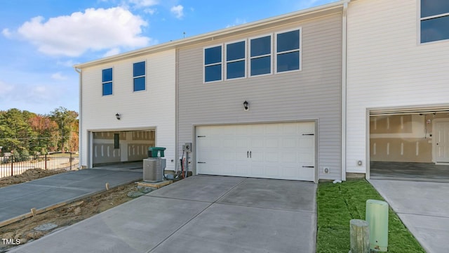 back of property featuring a garage