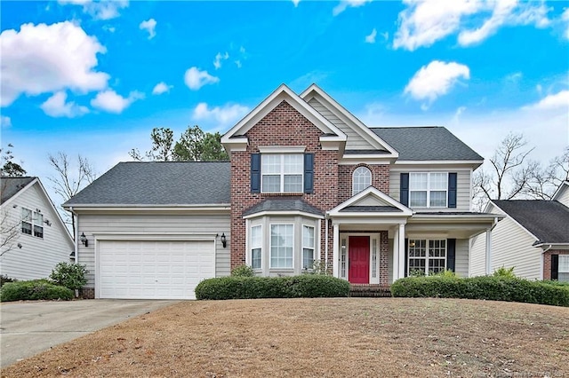 view of front of property featuring a garage