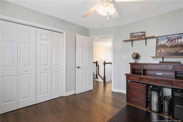 office space featuring dark hardwood / wood-style floors and ceiling fan