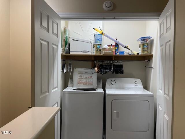 washroom featuring washer and dryer