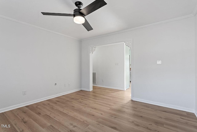 unfurnished room with ceiling fan, light hardwood / wood-style floors, and ornamental molding