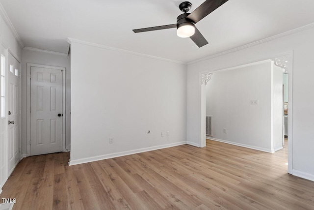 empty room with crown molding, light hardwood / wood-style flooring, and ceiling fan with notable chandelier