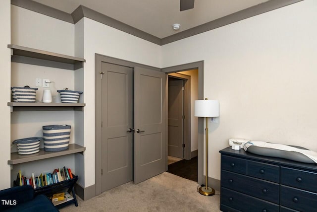 bedroom with light colored carpet