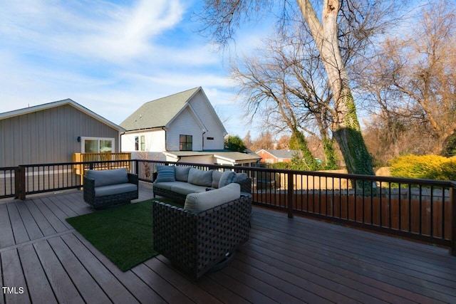 wooden terrace with outdoor lounge area