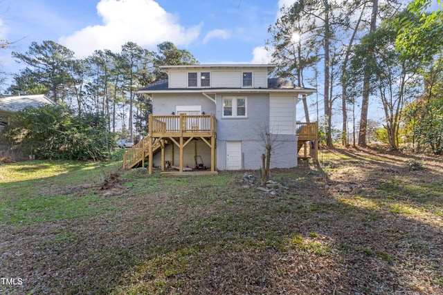 back of house featuring a deck