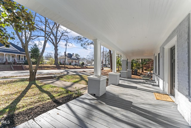 deck with covered porch