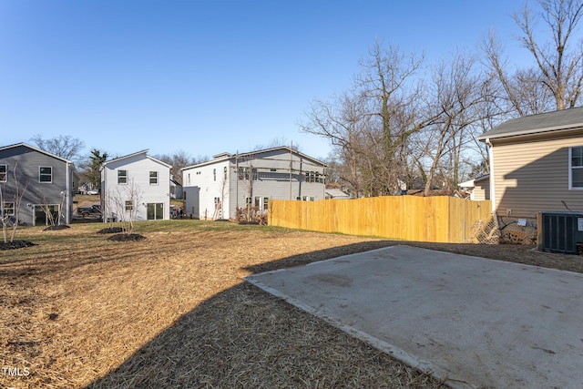 view of yard with a patio area and central AC