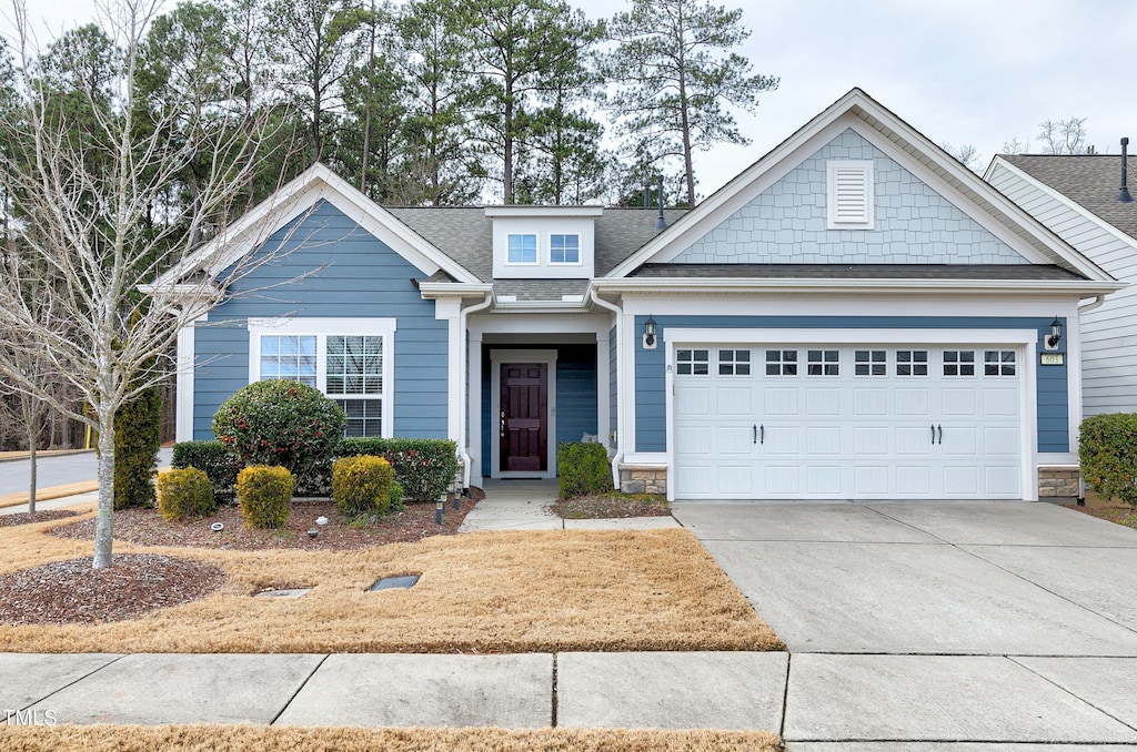 view of front of property with a garage