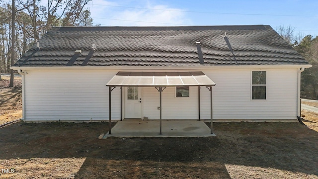 rear view of house featuring a patio