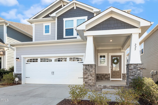 craftsman house with a garage