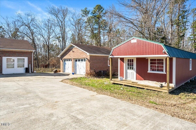 view of outdoor structure with a garage