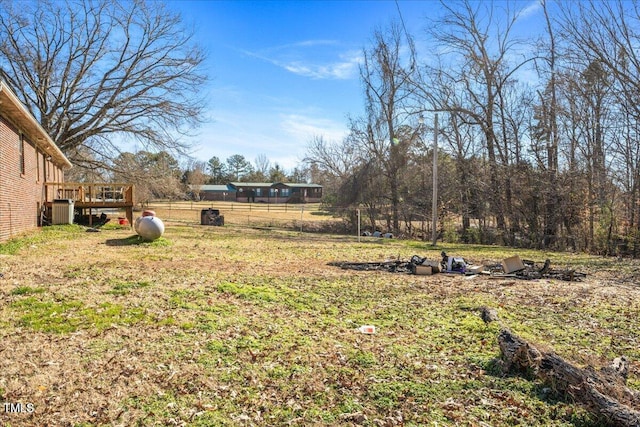 view of yard with a wooden deck