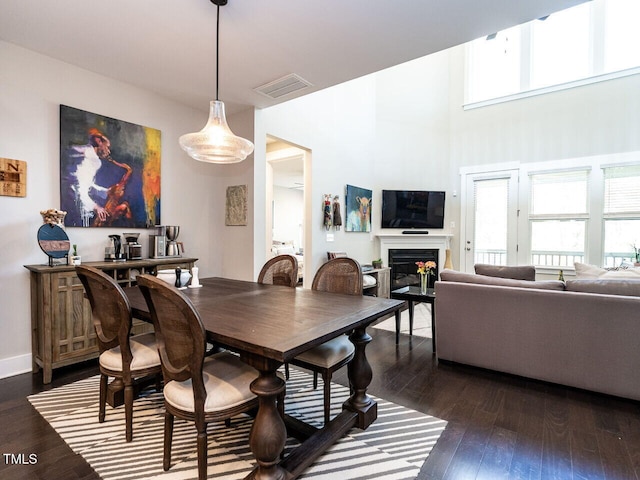 dining room featuring dark hardwood / wood-style flooring