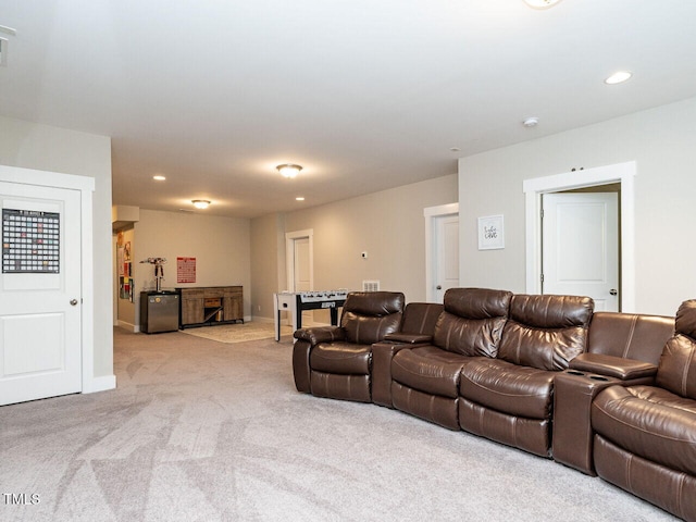 living room featuring light carpet