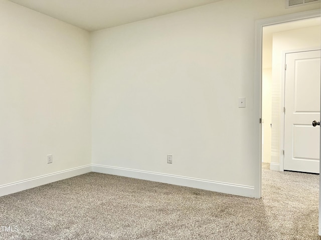 view of carpeted spare room